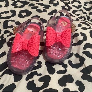 Mel by Melissa | clear jelly sandals pink bow